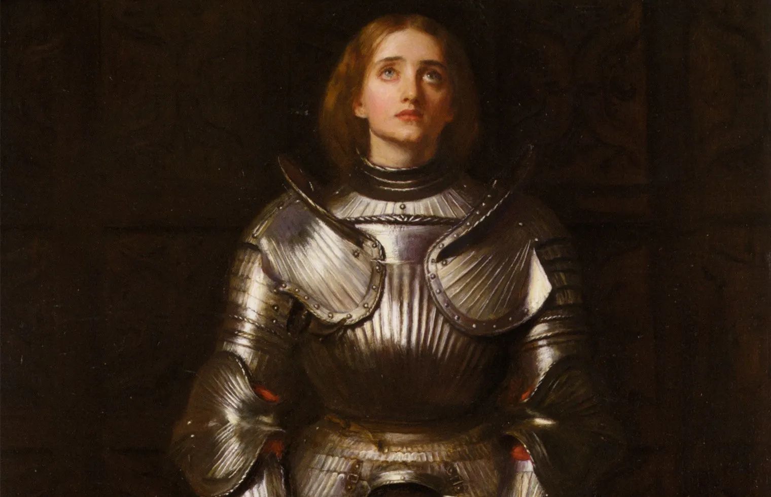 Joan of Arc in armor holding her banner, patron saint of soldiers and France