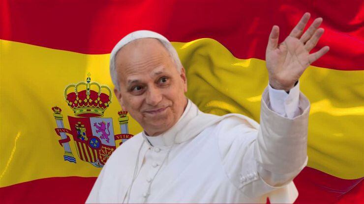 Pope Leo XIV waving in white papal attire before the Spanish flag during his historic 2026 visit to Spain.
